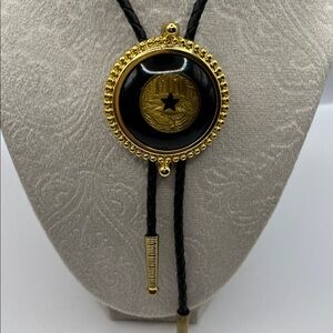 Black and Gold Bolo Tie with Circular Pendant with Star Center Black Braided